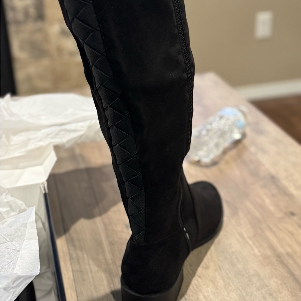 Torrid boots 
Brand new 
Size 8.5